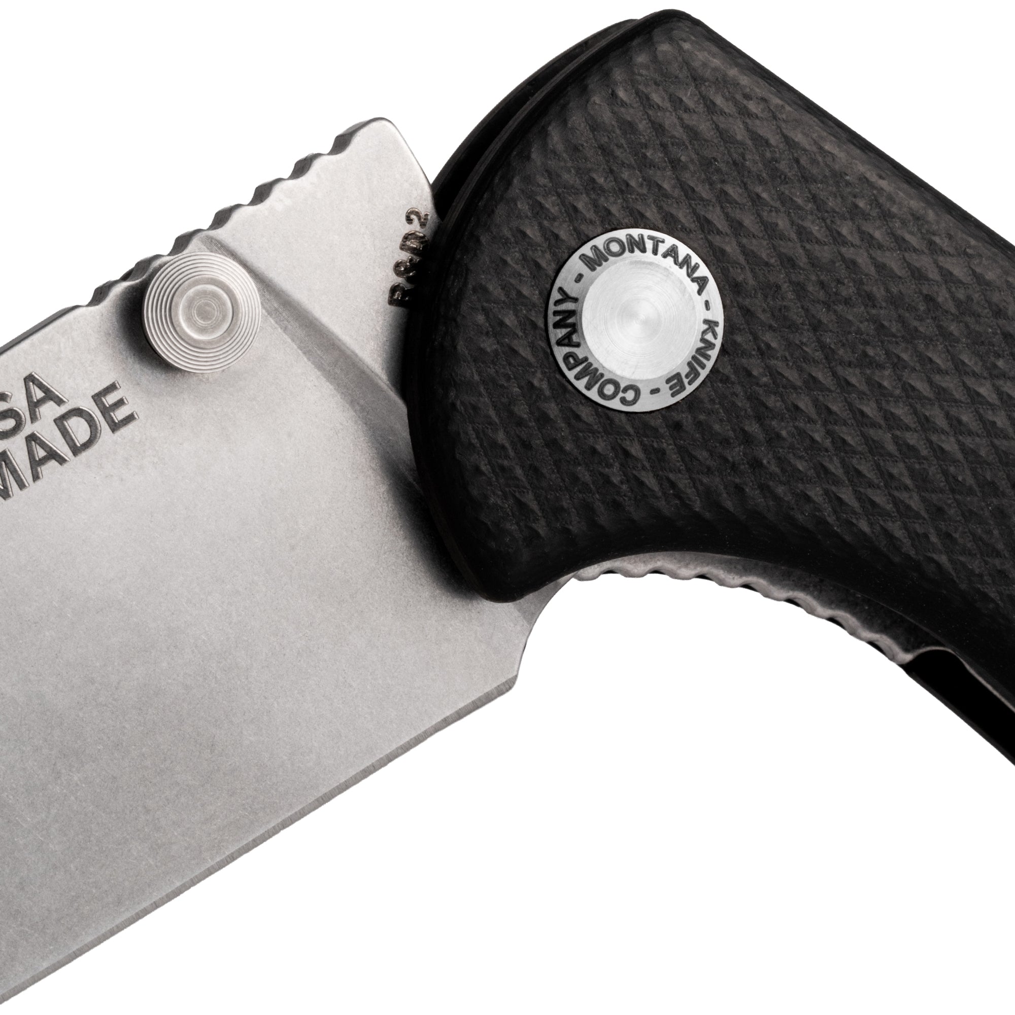 Close-up of The Montana knife showcasing its durable blade and textured handle, highlighting American craftsmanship.