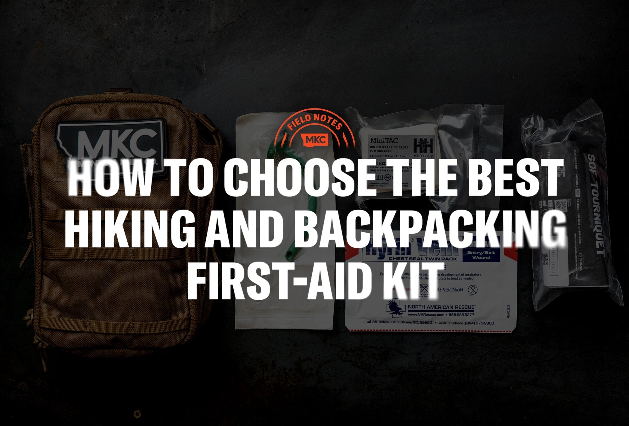 Hunter-style hiking first-aid kit laid out with tourniquet, chest seal, and gauze for backcountry emergencies.