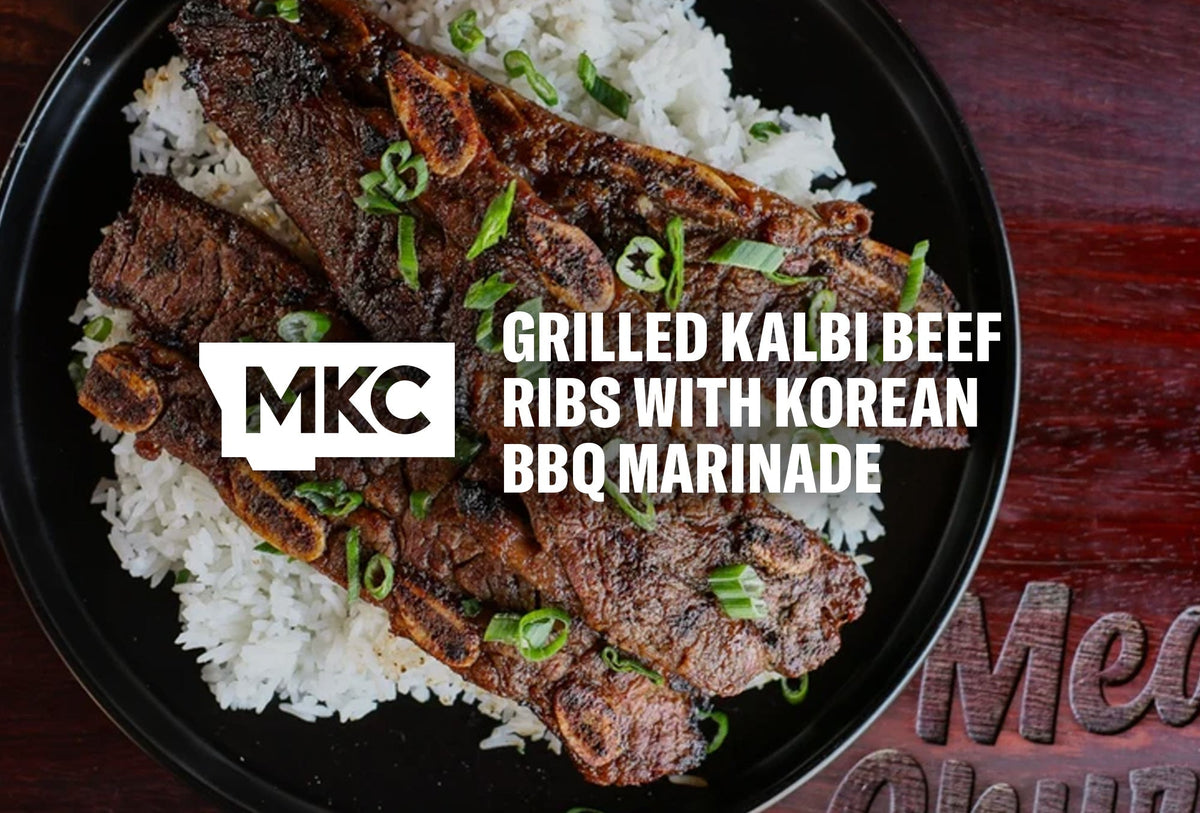 Grilled kalbi beef short ribs over white rice, topped with green onions.