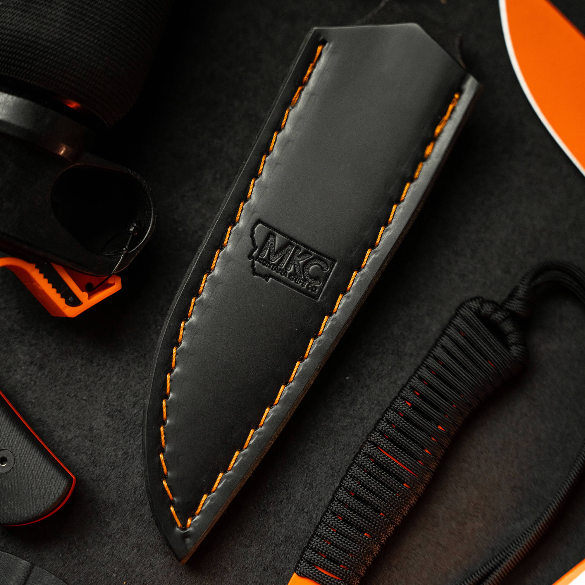 BLACK/ORANGE SPEEDGOAT 2.0 LEATHER SHEATH - VERTICAL BELT CARRY